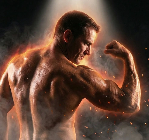 Shirtless muscular man showing strength - peak performance